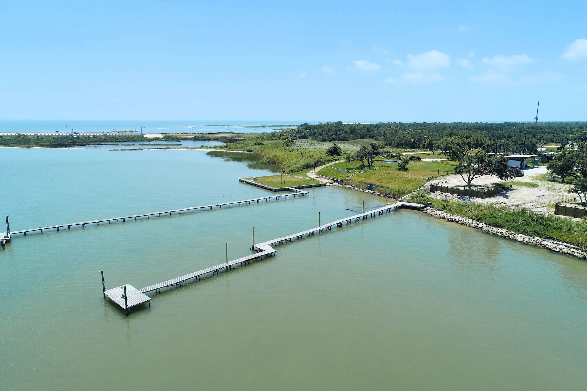 Matagorda waterfront scenery with coastal water, docks, and open shoreline